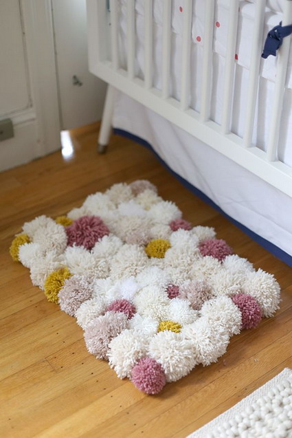 alfombra pompones