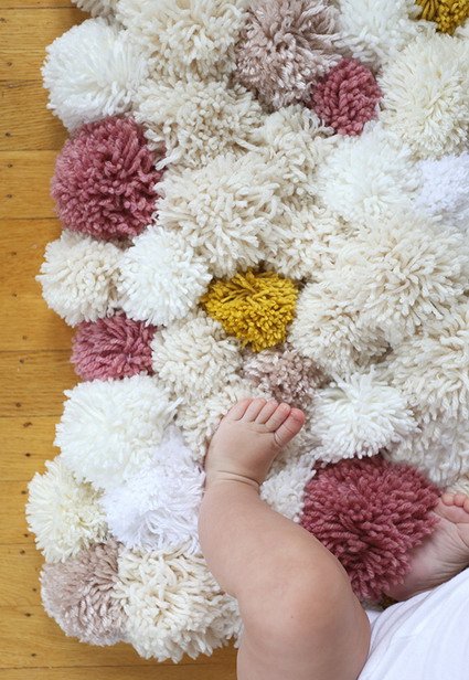 alfombra pompones
